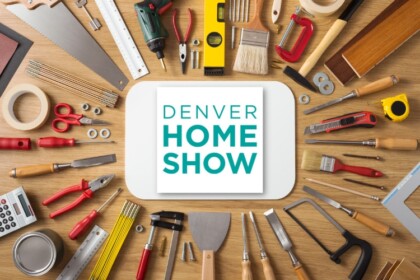 A table full of tools encircles a sign that reads "The Denver Home Show." By remodeling contractors Christie's Design/Build.